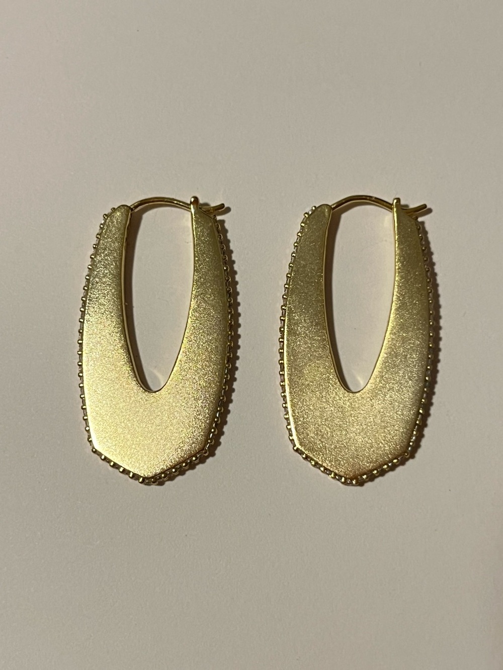 Kendra Scott Gold Textured Shield Hoop Earrings with Clear Stones Around Edges